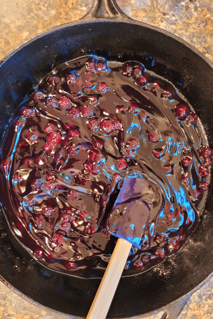 Image illustrates blueberry cobbler. 