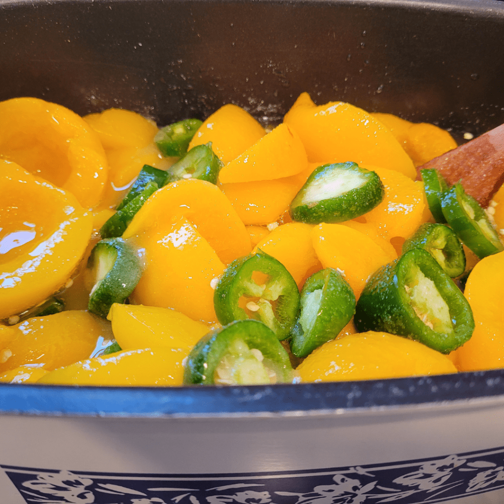 Image illustrates peach jalapeno jam.