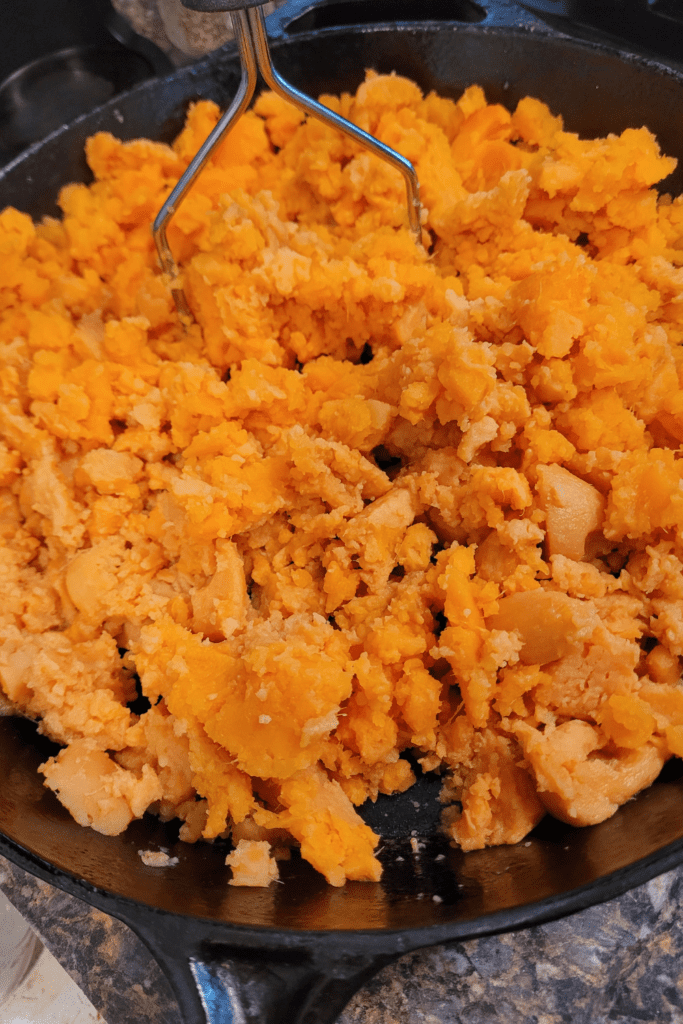 Image illustrates mashed sweet potatoes for sweet potato casserole recipe.