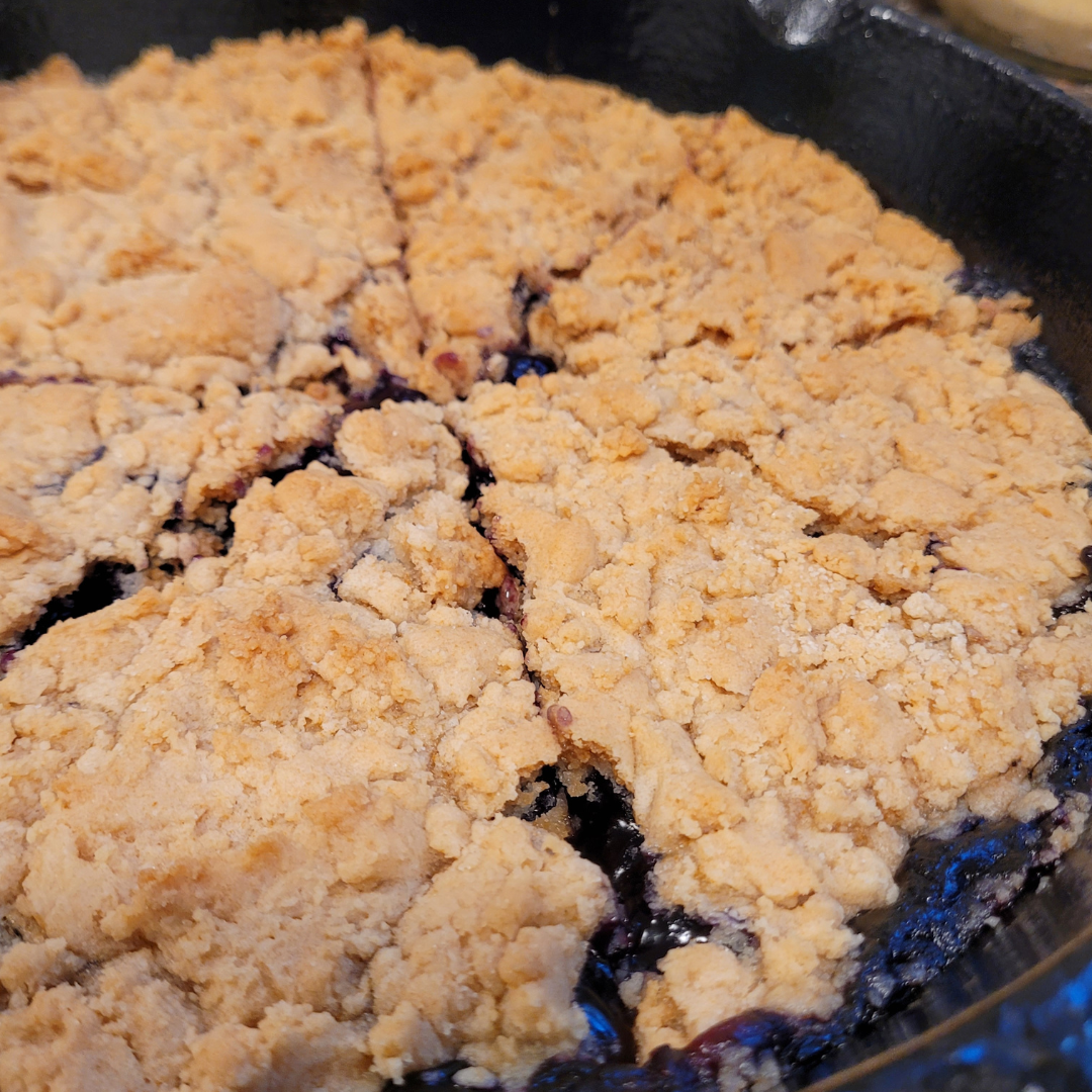 Image illustrates blueberry cobbler.