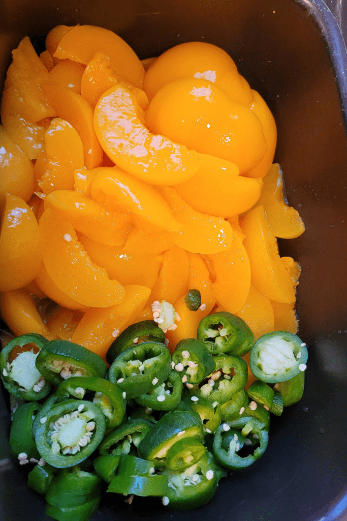 Image illustrates peach jalapeno jam.