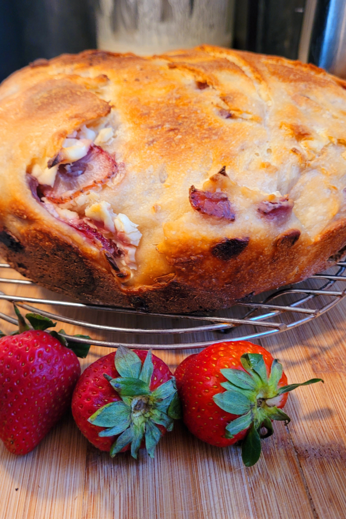 Image illustrates strawberries and cream sourdough bread