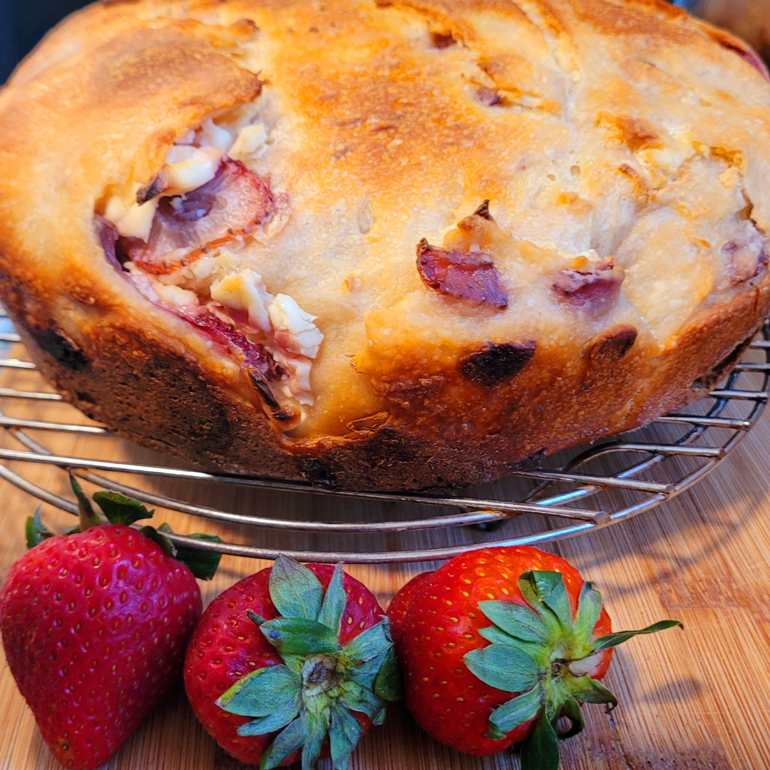 Image illustrates strawberries and cream sourdough bread