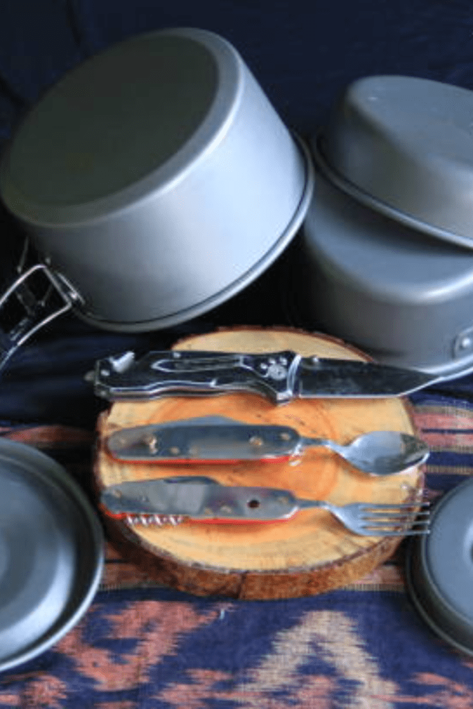 Image illustrates camping utensils for campfire cooking.