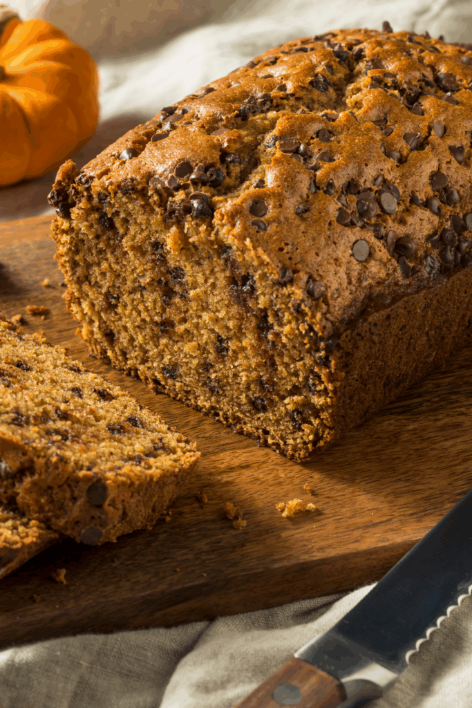 Image illustrates chocolate chip pumpkin bread.