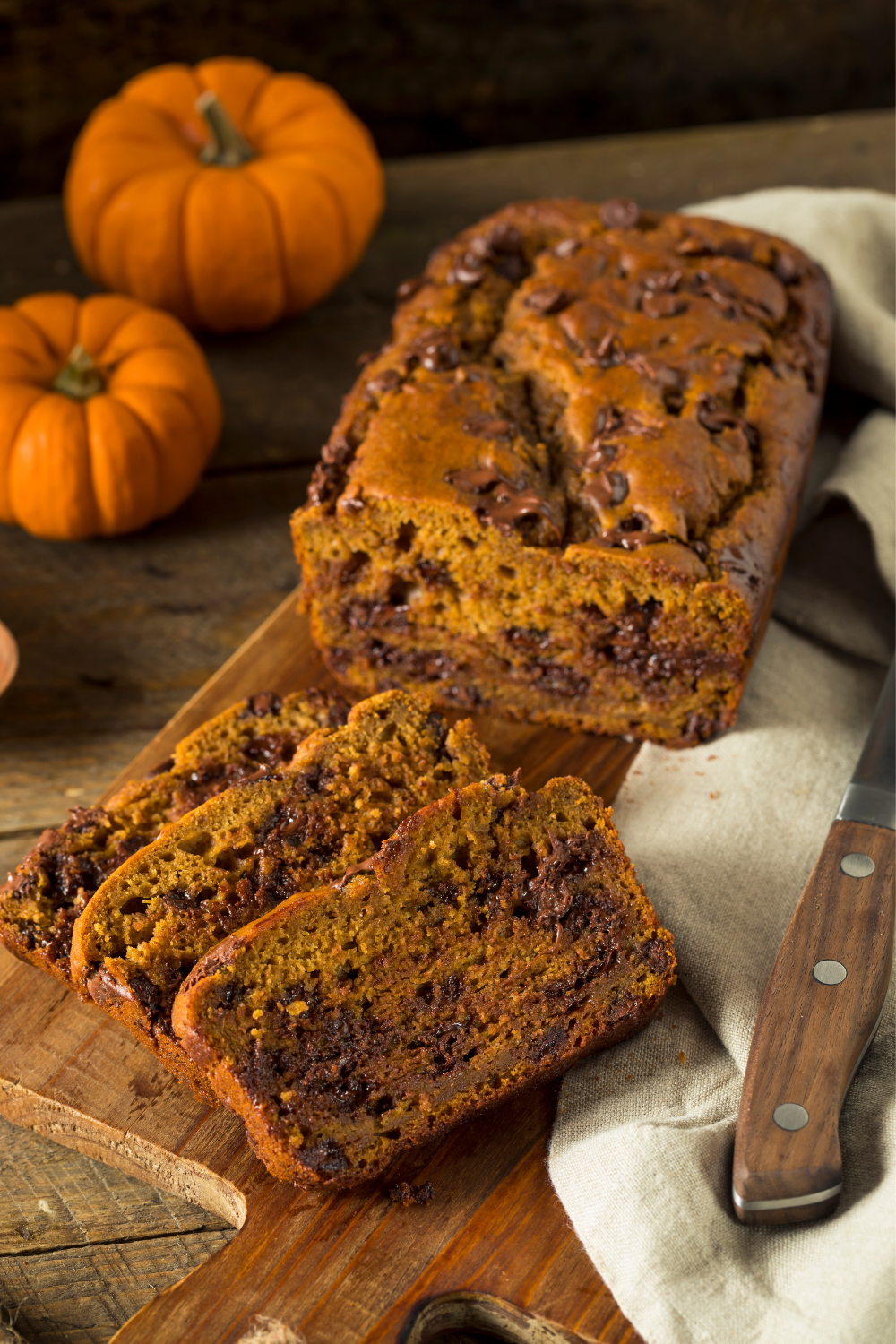 Image illustrates chocolate chip pumpkin bread.