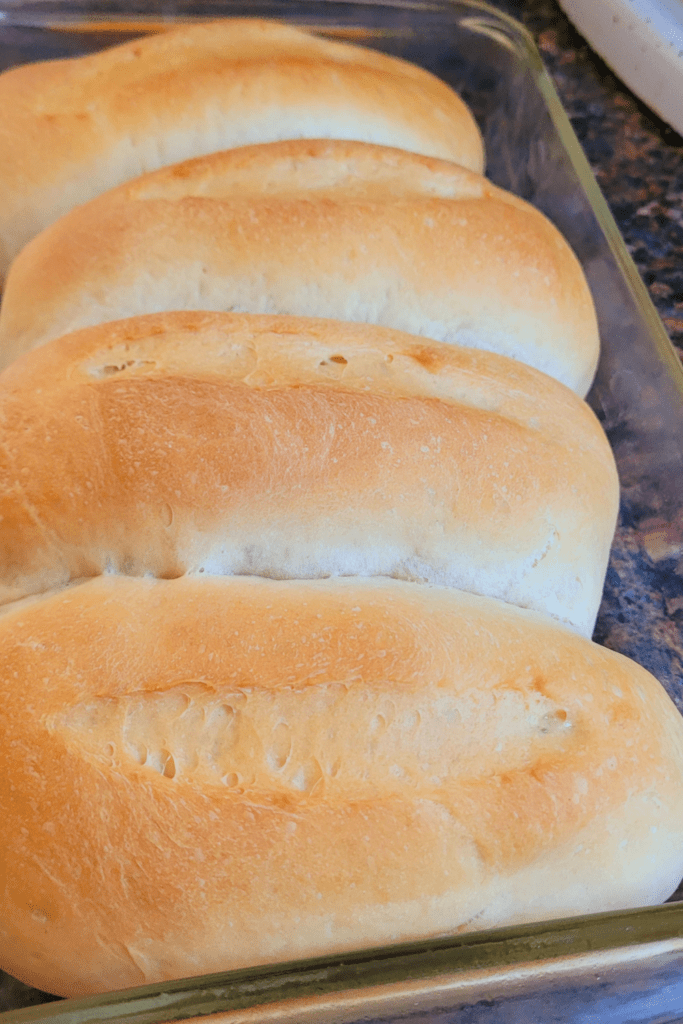 Image illustrates hoagies made from scratch for a hoagie buns recipe.