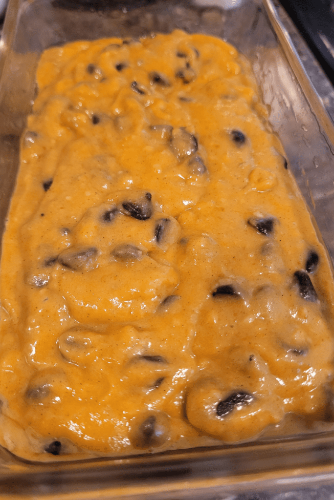 Image illustrates chocolate chip pumpkin bread. 
