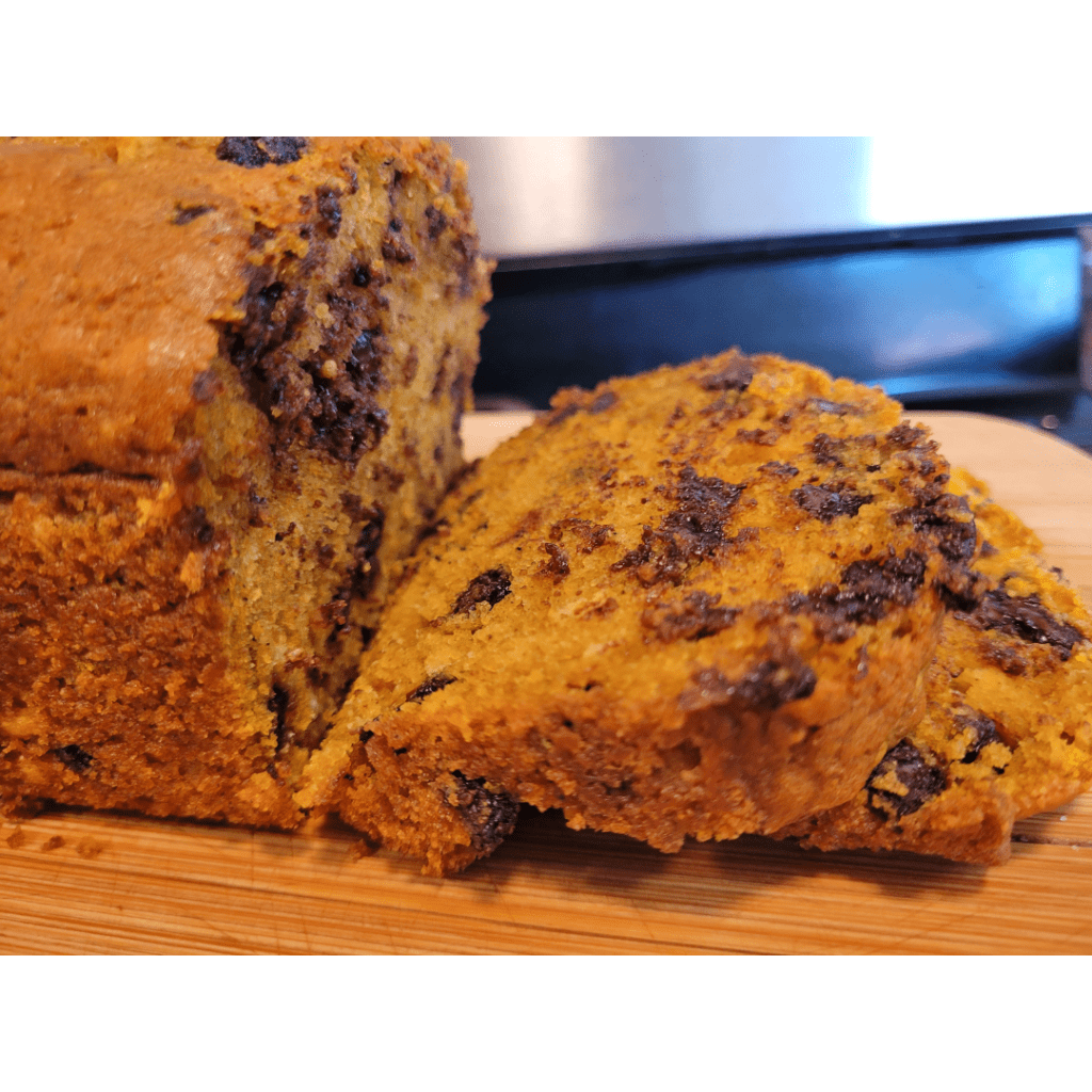 Image illustrates chocolate chip pumpkin bread. 