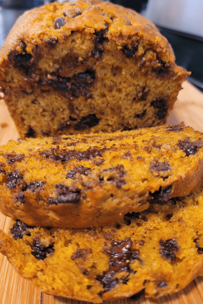 Image illustrates chocolate chip pumpkin bread. 