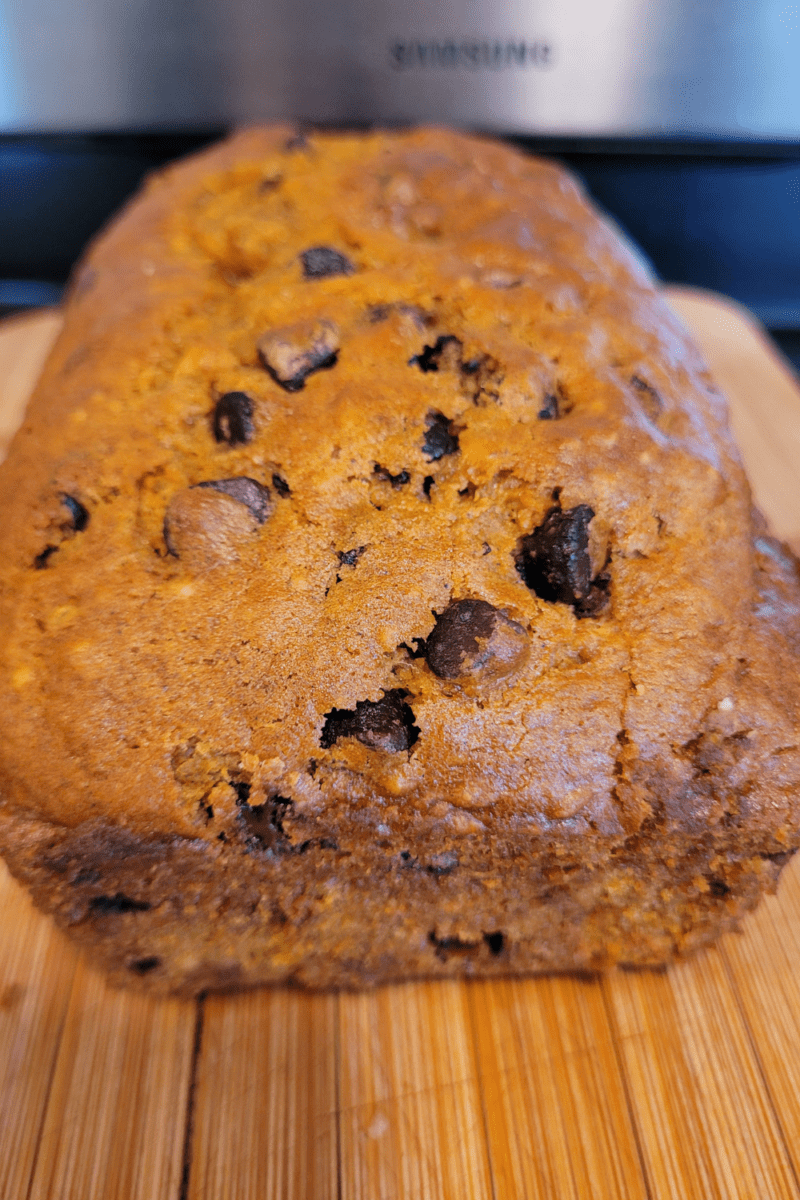 Image illustrates chocolate chip pumpkin bread. 