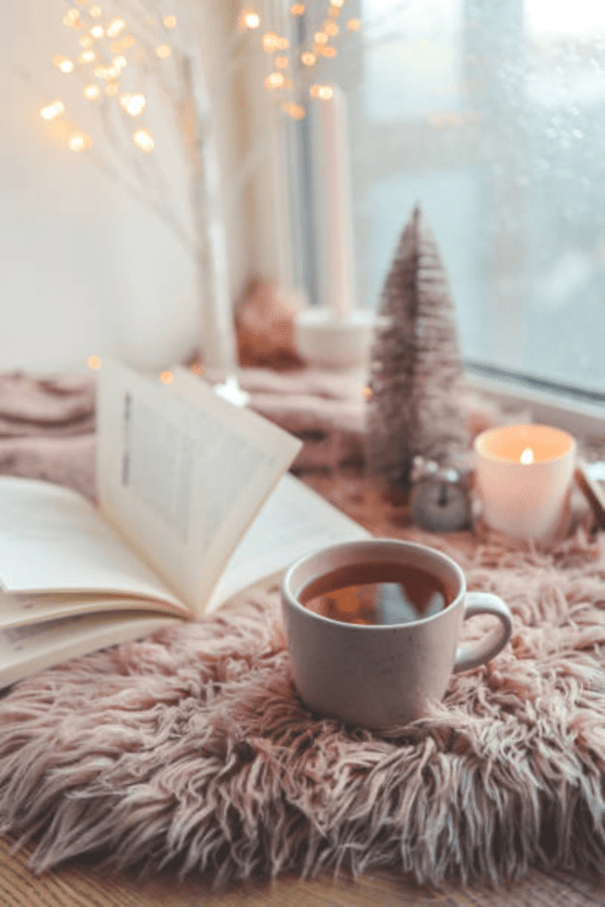 Image illustrates a cozy home with a reading nook.