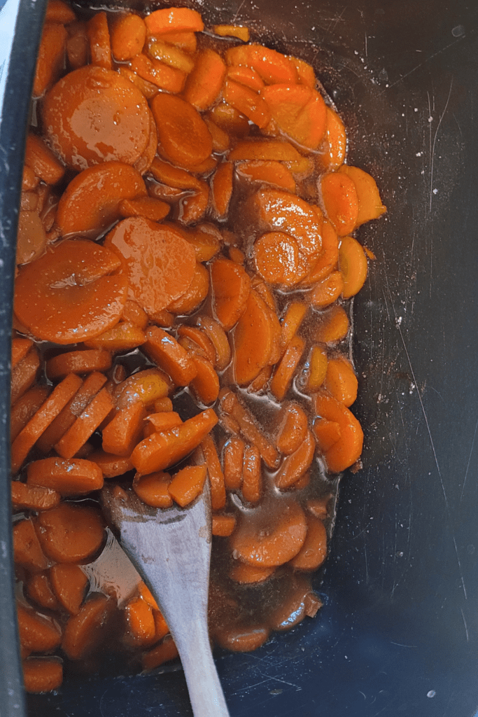 Image illustrates chopped carrots for carrot cake butter.