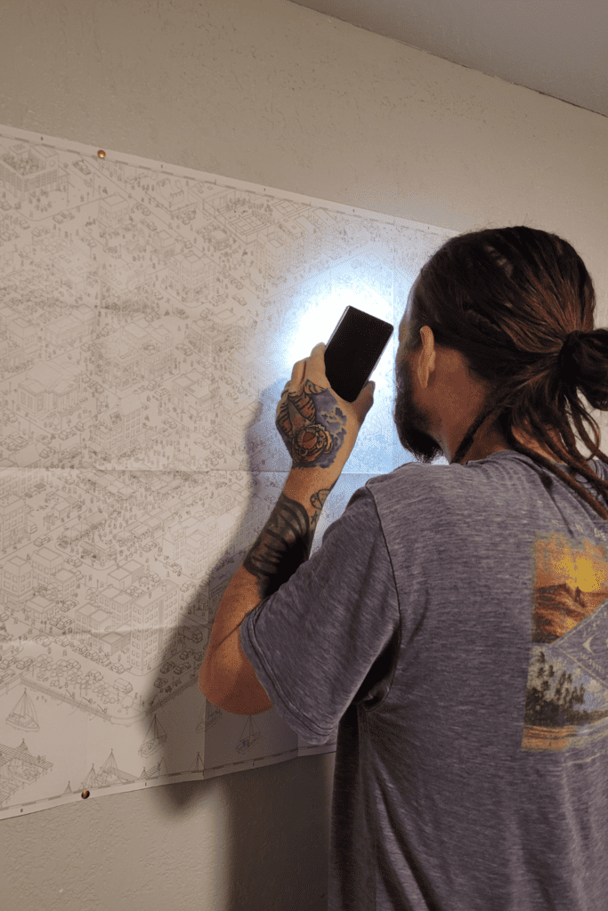 Image illustrates MicroMacro Crime City Game for fun family games.