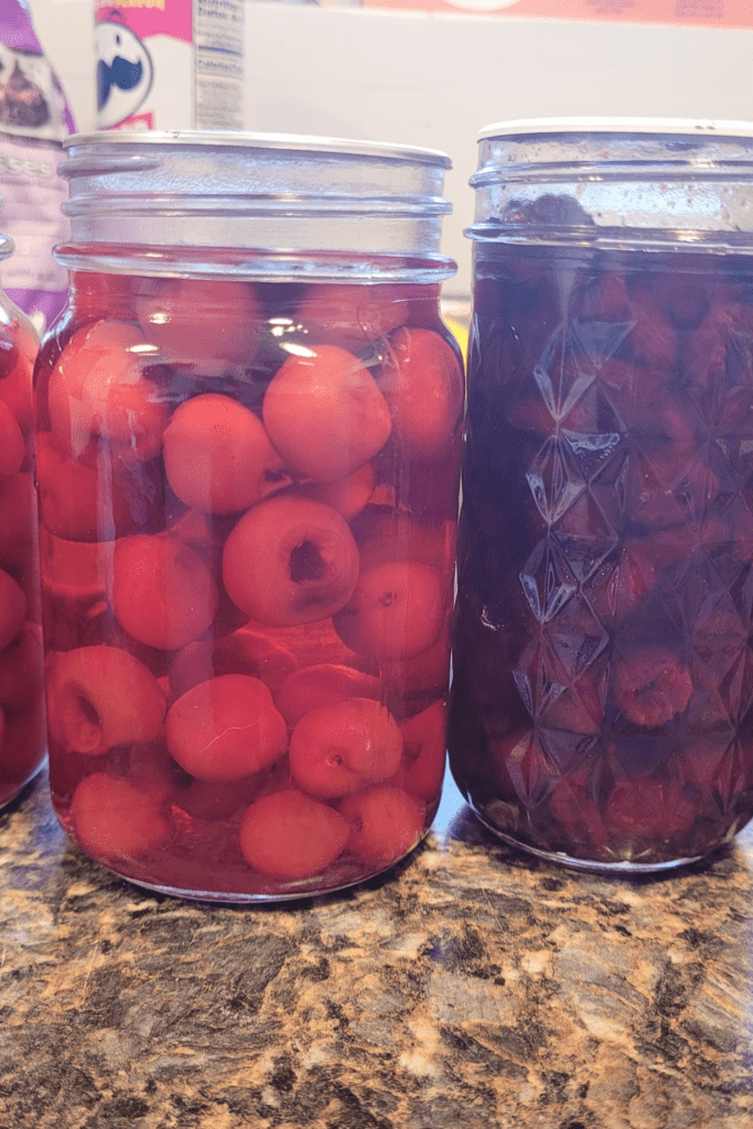 Image illustrates jars of cherries and cherry pie filling for cherry galette.