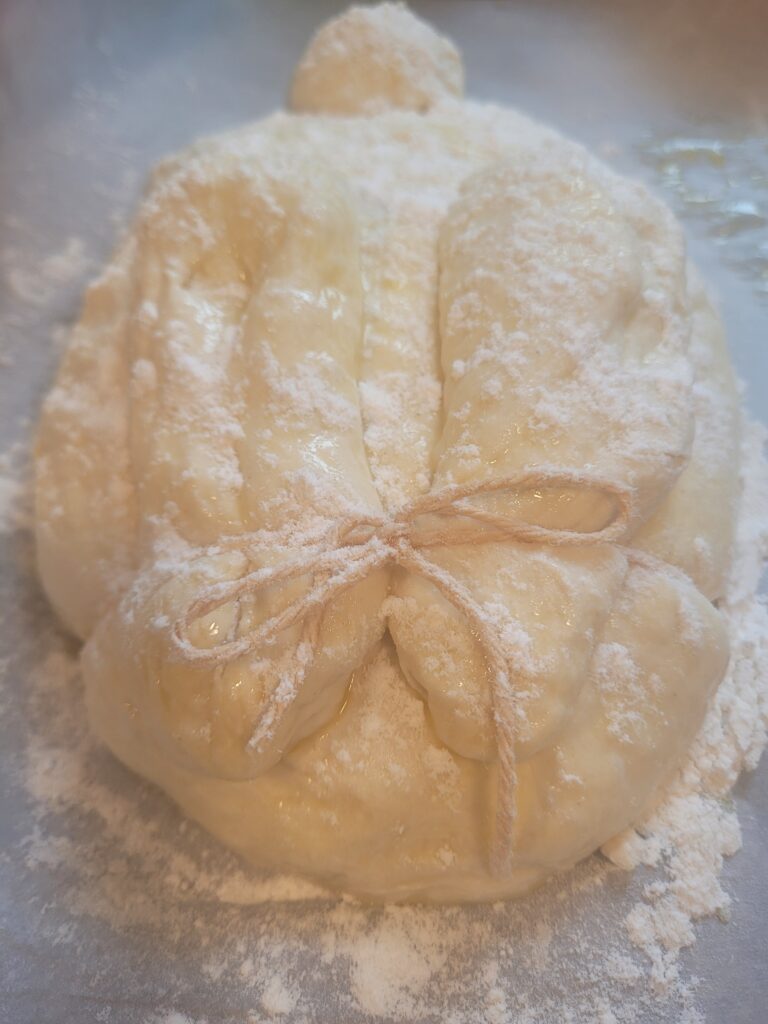 Image illustrates an Easter bunny sourdough bread.