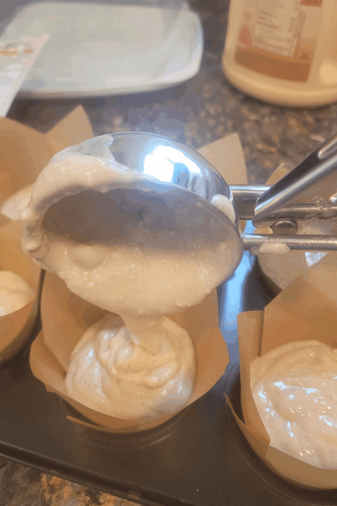 Image illustrates sourdough banana muffins.