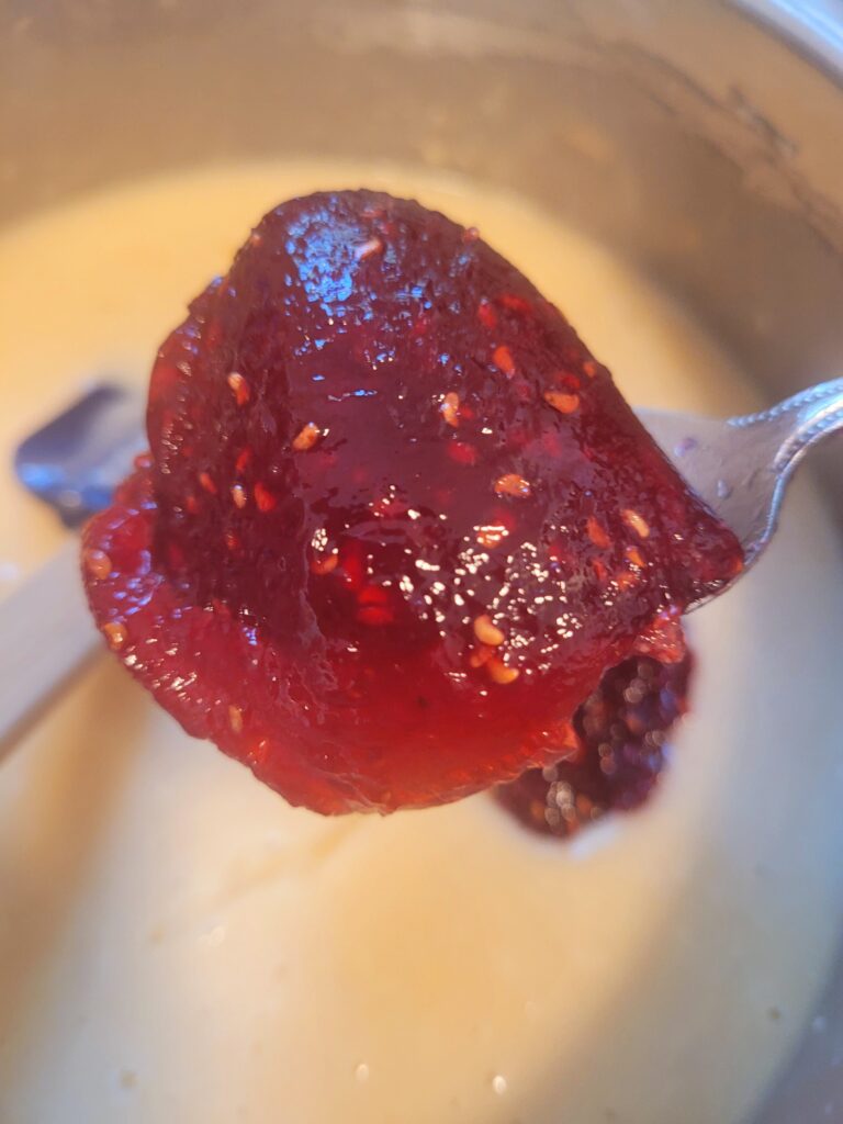 Image illustrates jelly donut quick bread with raspberry jam.