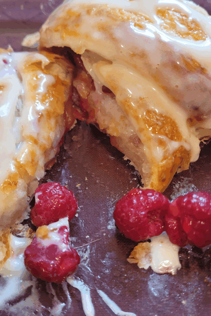 Image illustrates puff pastry raspberry and cream butter braid.