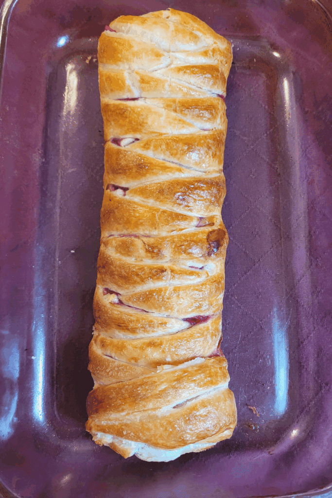 Image illustrates puff pastry raspberry and cream butter braid.