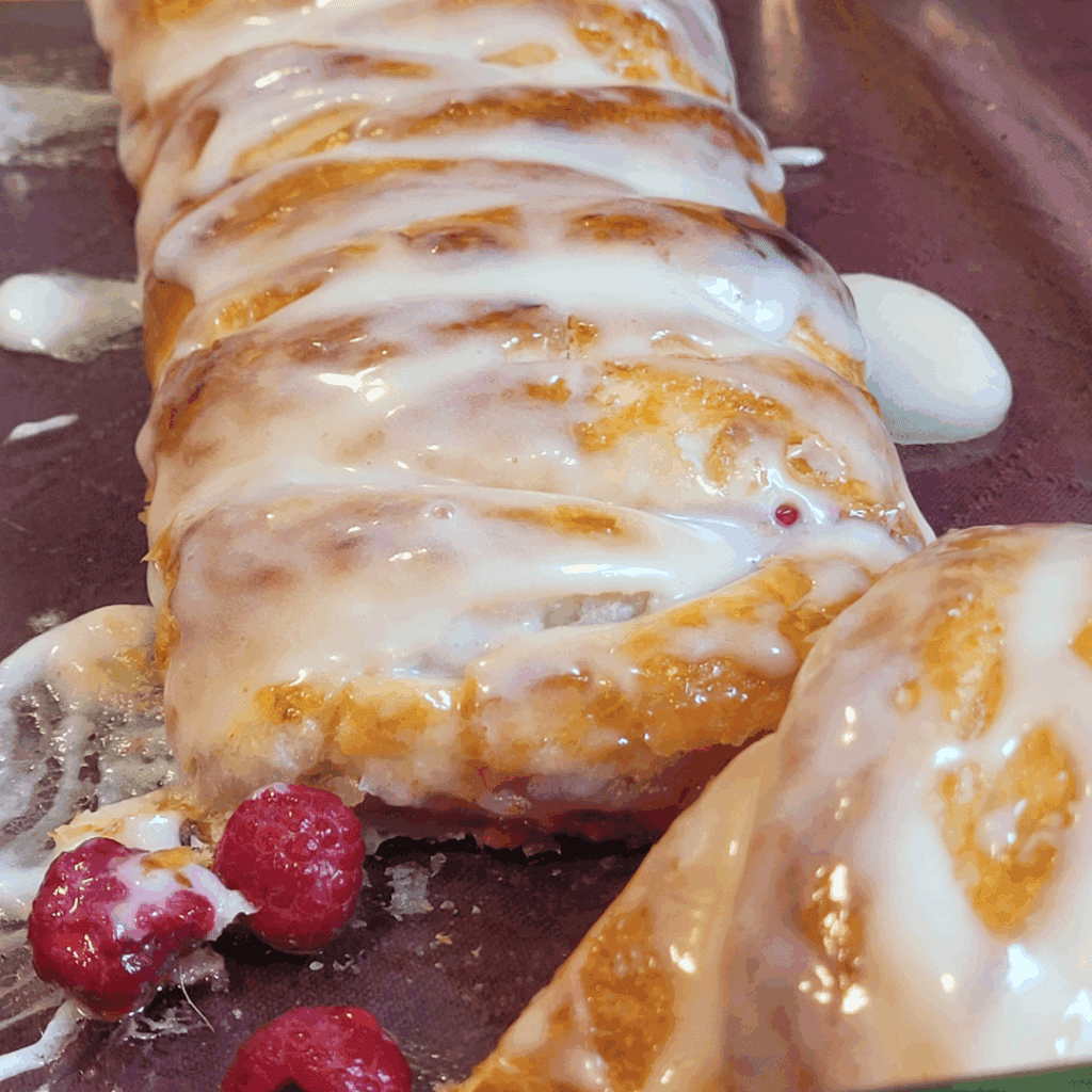 Image illustrates raspberry and cream butter braid.