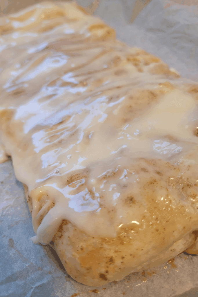 Image illustrates puff pastry peaches and cream butter braid.