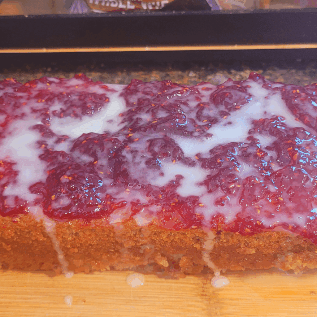 Image illustrates jelly donut quick bread.
