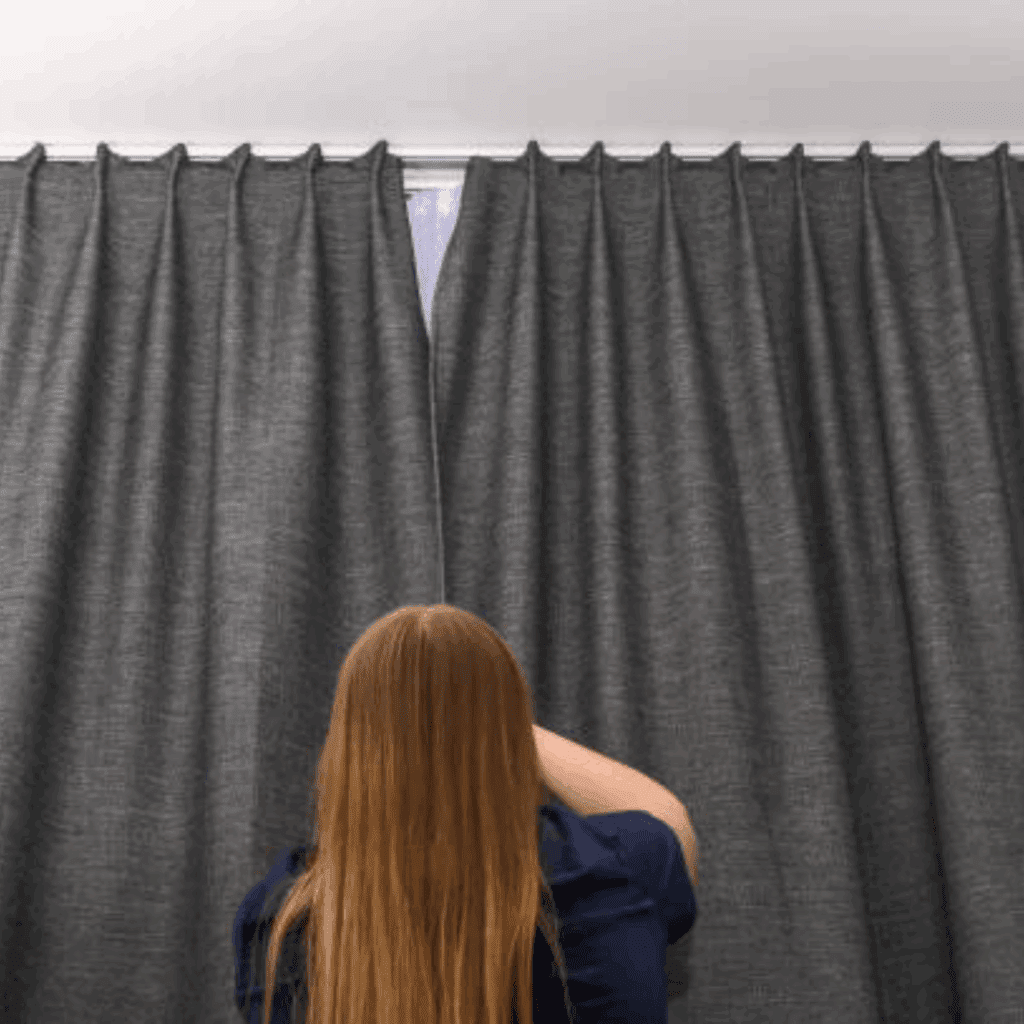 Image illustrates blackout curtains for off grid summer survival tips.