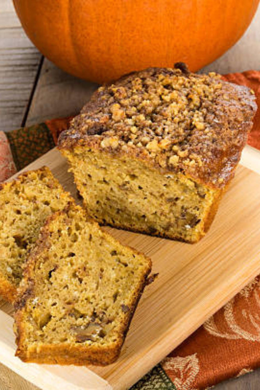 Image illustrates pumpkin zucchini bread.
