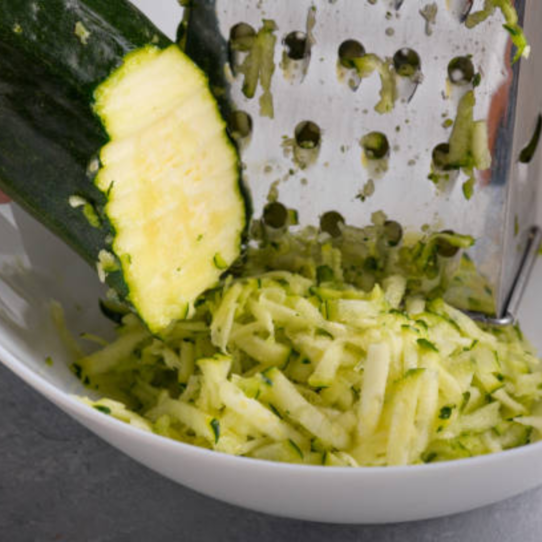 Image illustrates grated zucchini.