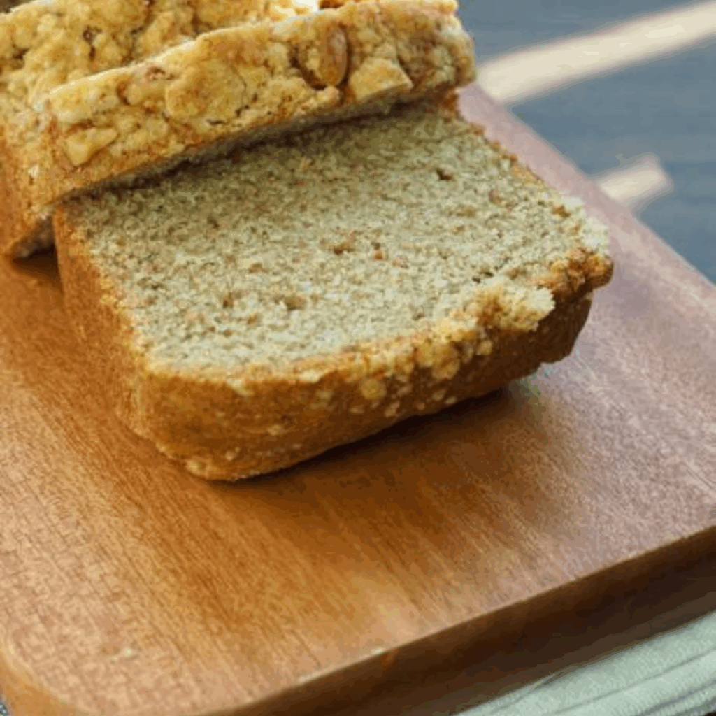 Image illustrates streusel pear bread.