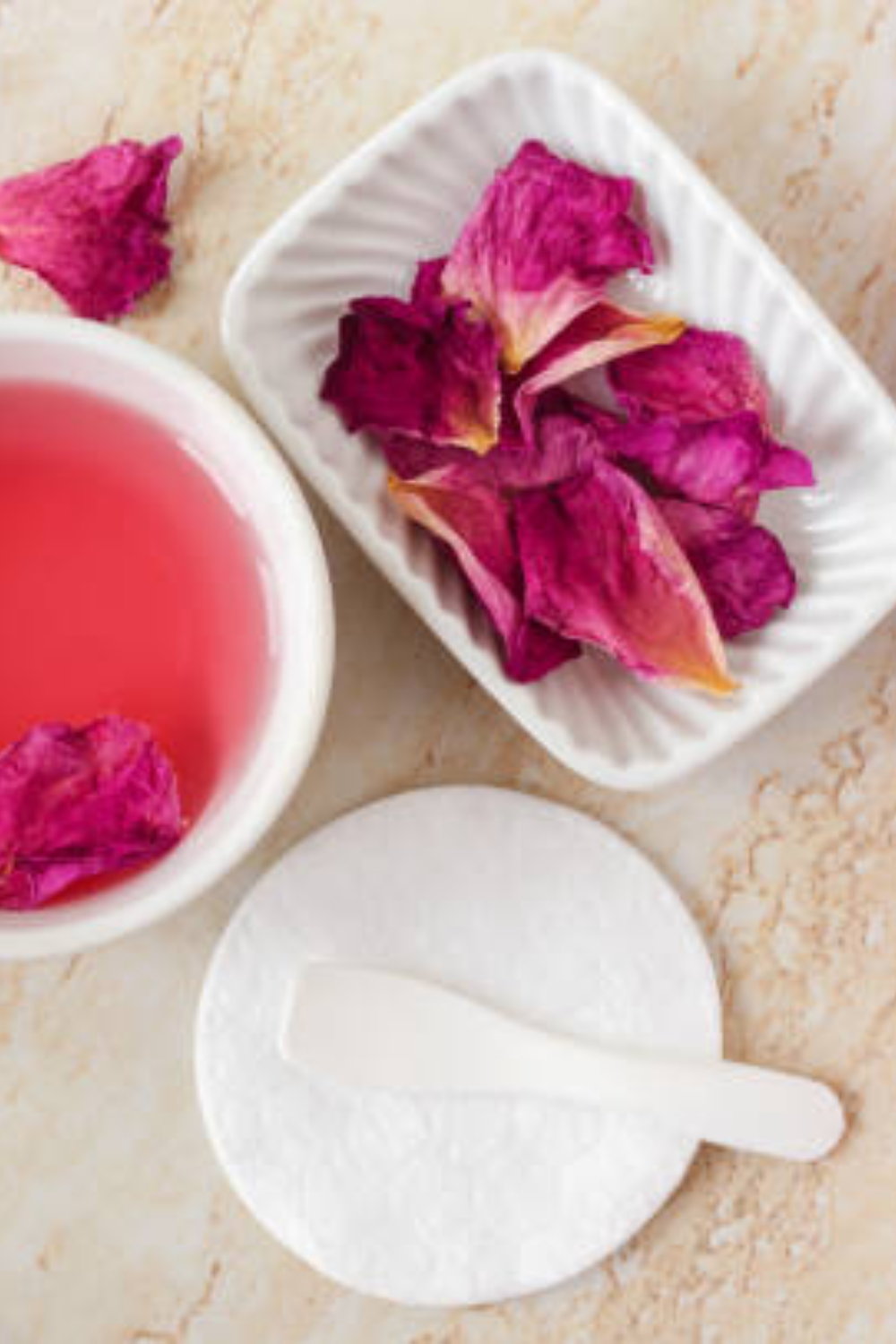 Image illustrates rose petals for rose petal facial steam.