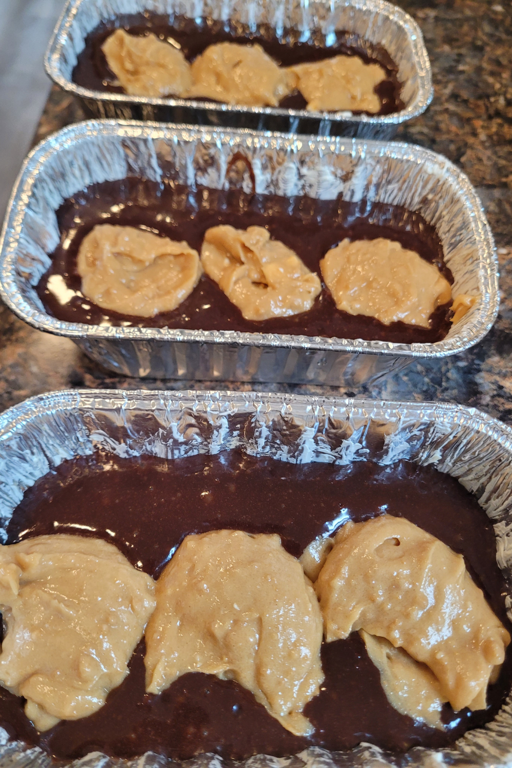 Image illustrates peanut butter brownie mini loaves.