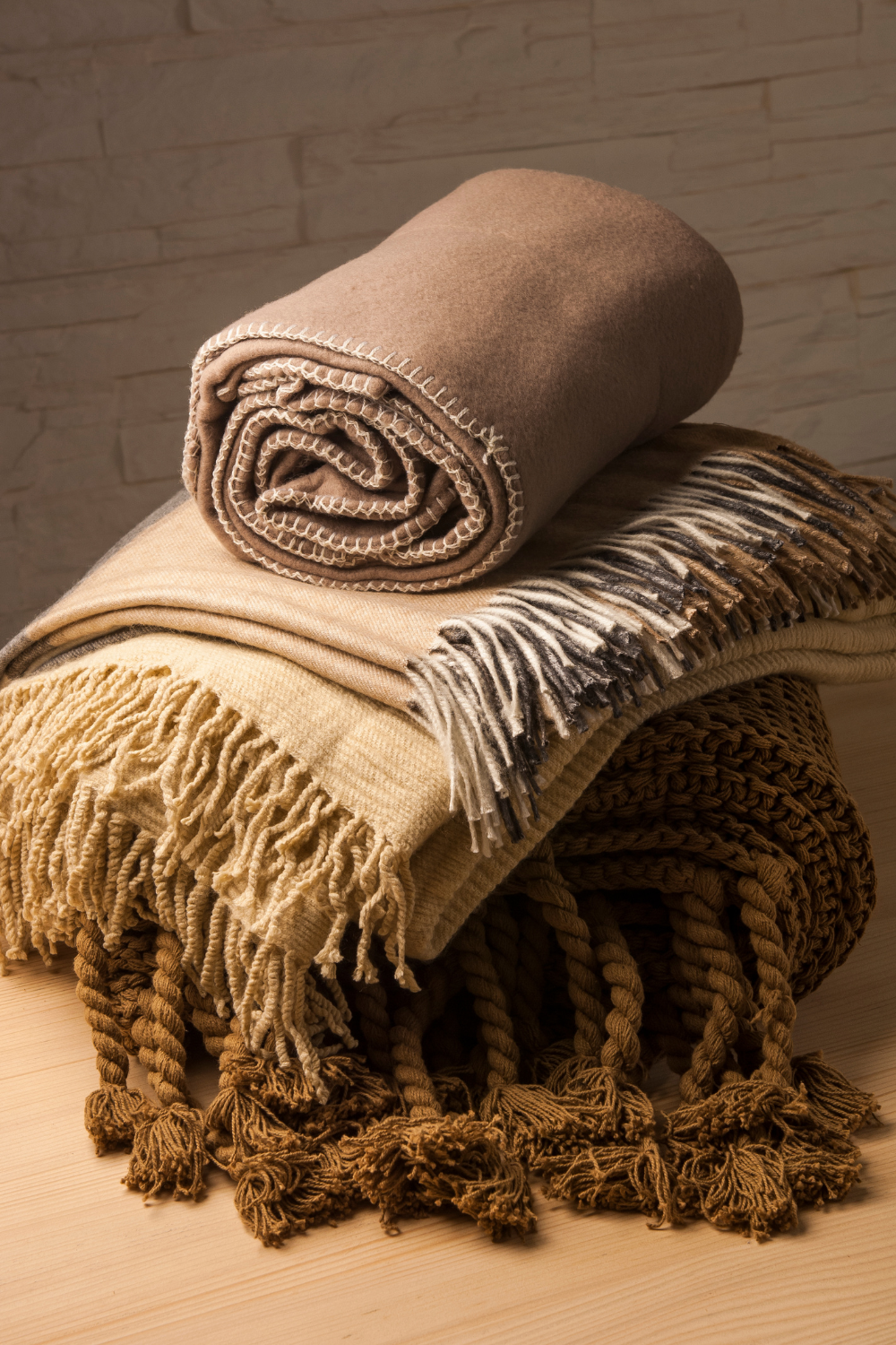 Image illustrates blankets for how to prep your home for chilly fall nights.