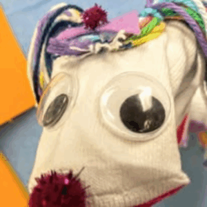 Image illustrates a sock puppets demonstrating how to make sock puppets.