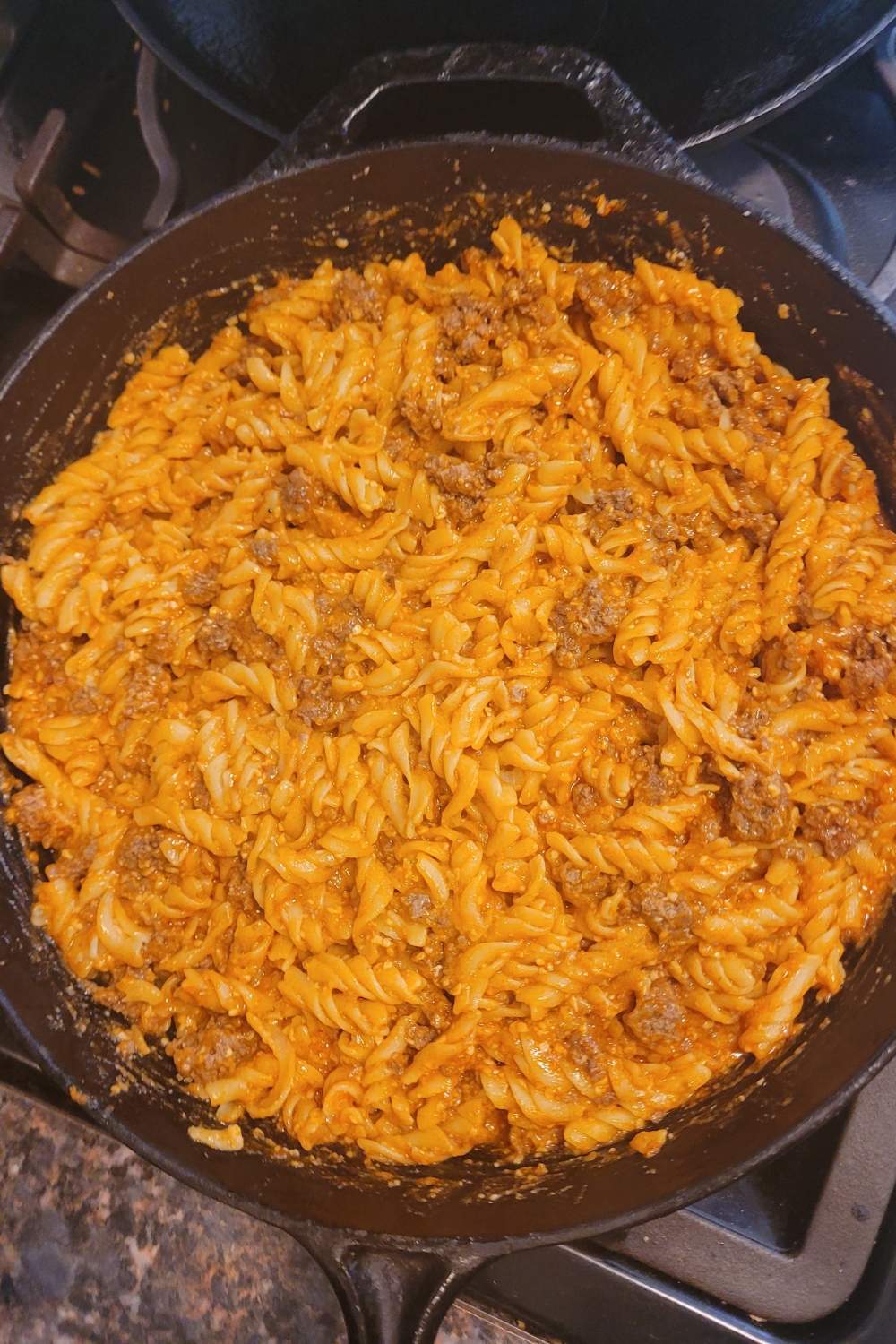 Image illustrates pizza casserole.