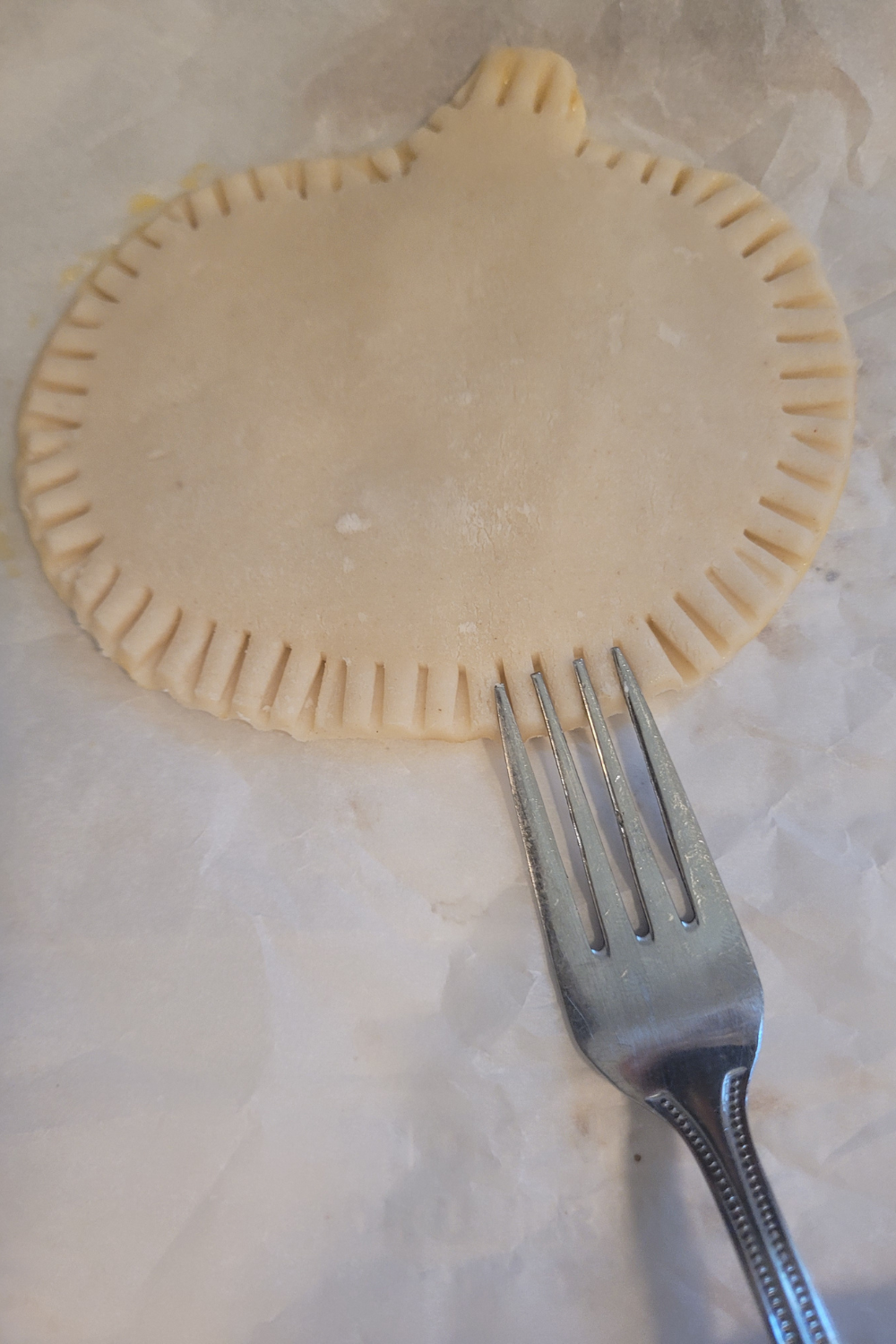 Image illustrates pumpkin hand pies.