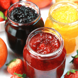 Image illustrates canned jam for how to can and preserve holiday flavors.