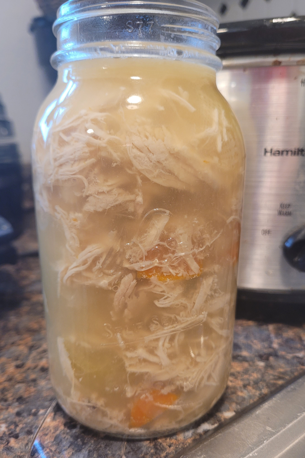 Image illustrates homemade chicken soup.