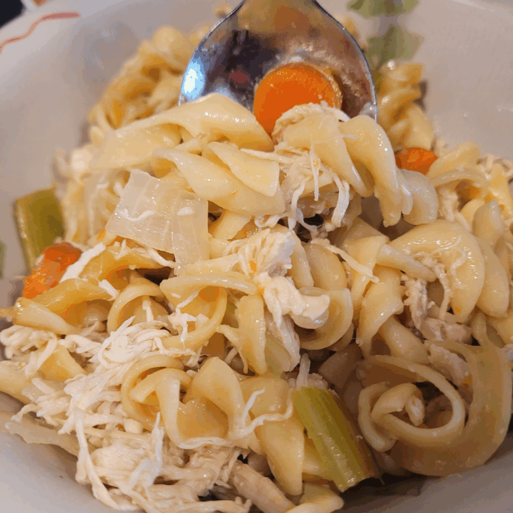 Image illustrates homemade chicken soup.