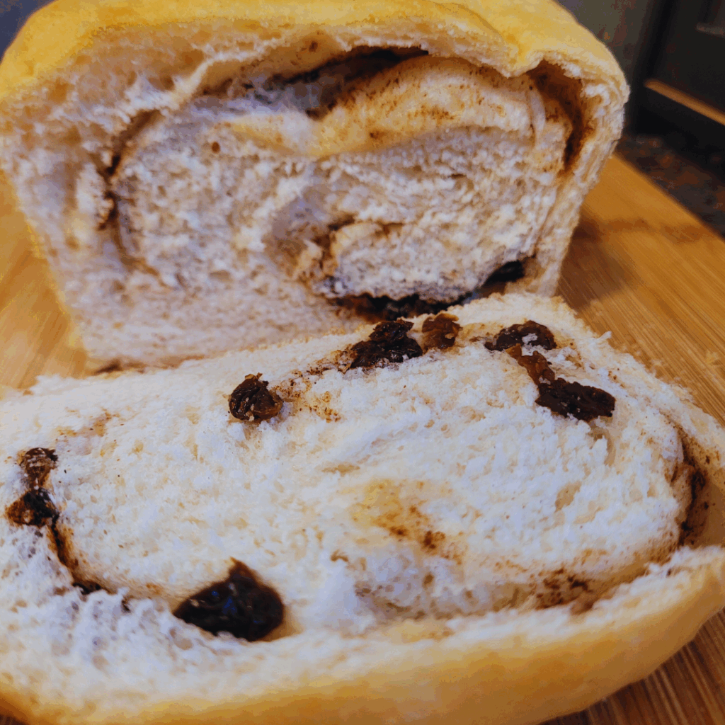 Image illustrates homemade cinnamon raisin bread.