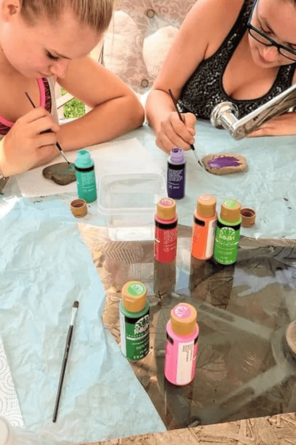 Image illustrates nature crafts for kids and rock painting.