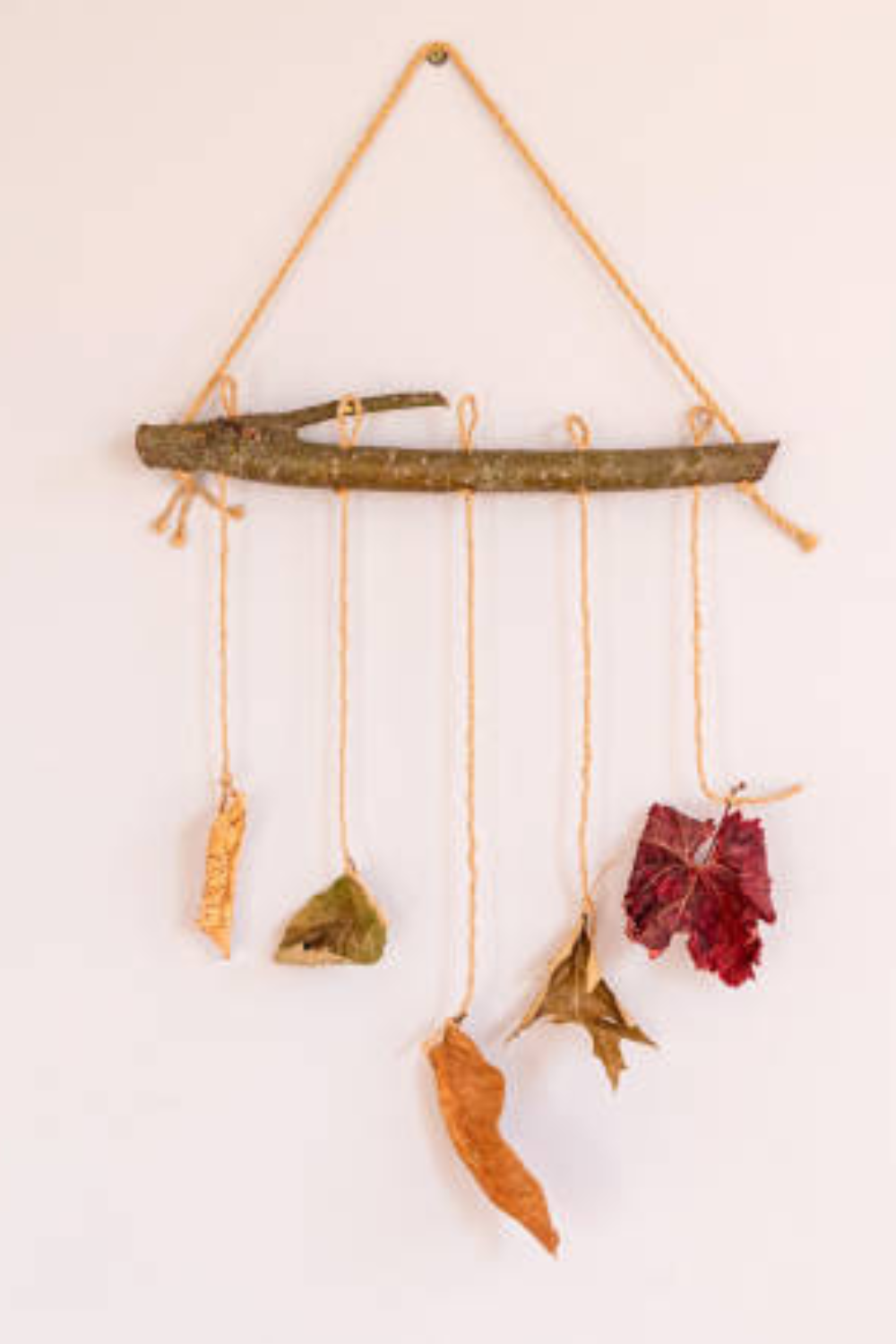 Image illustrates nature crafts for kids and nature mobile crafts.