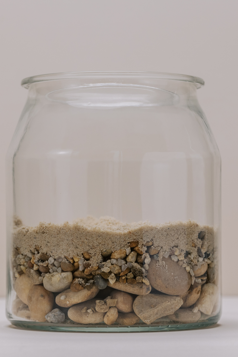 Image illustrates nature crafts for kids and shell and sand art jars.