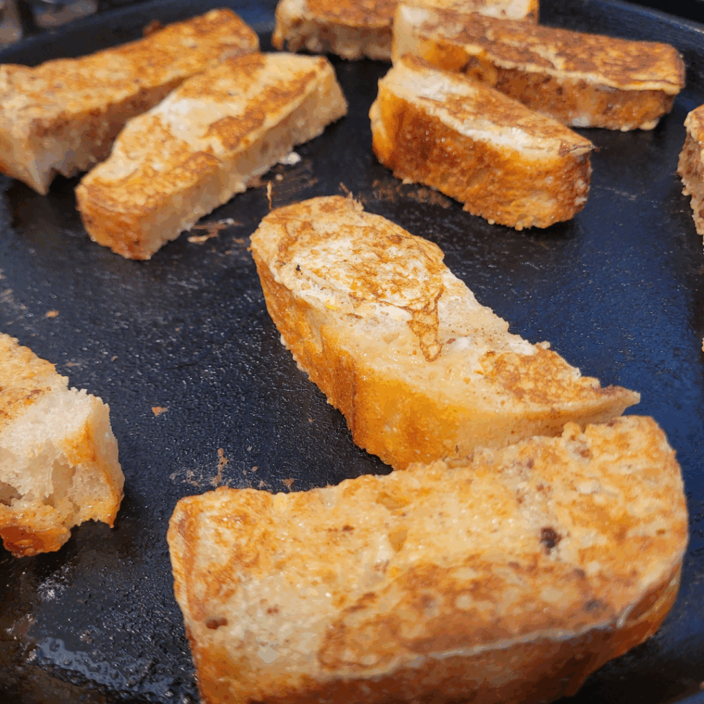 Image illustrates homemade French toast sticks.