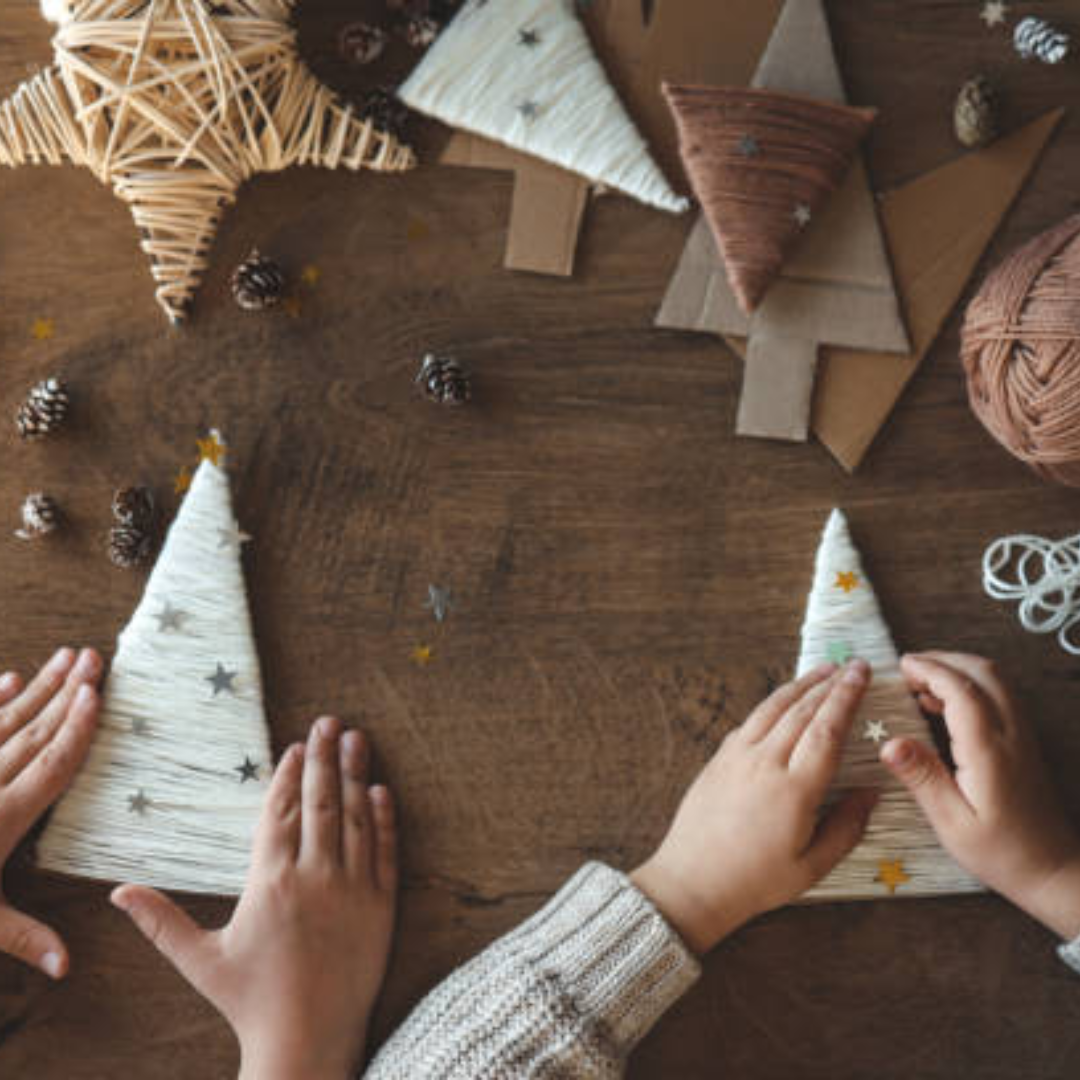 Image illustrates cardboard Christmas shapes and yarn crafts for easy Christmas crafts for kids.