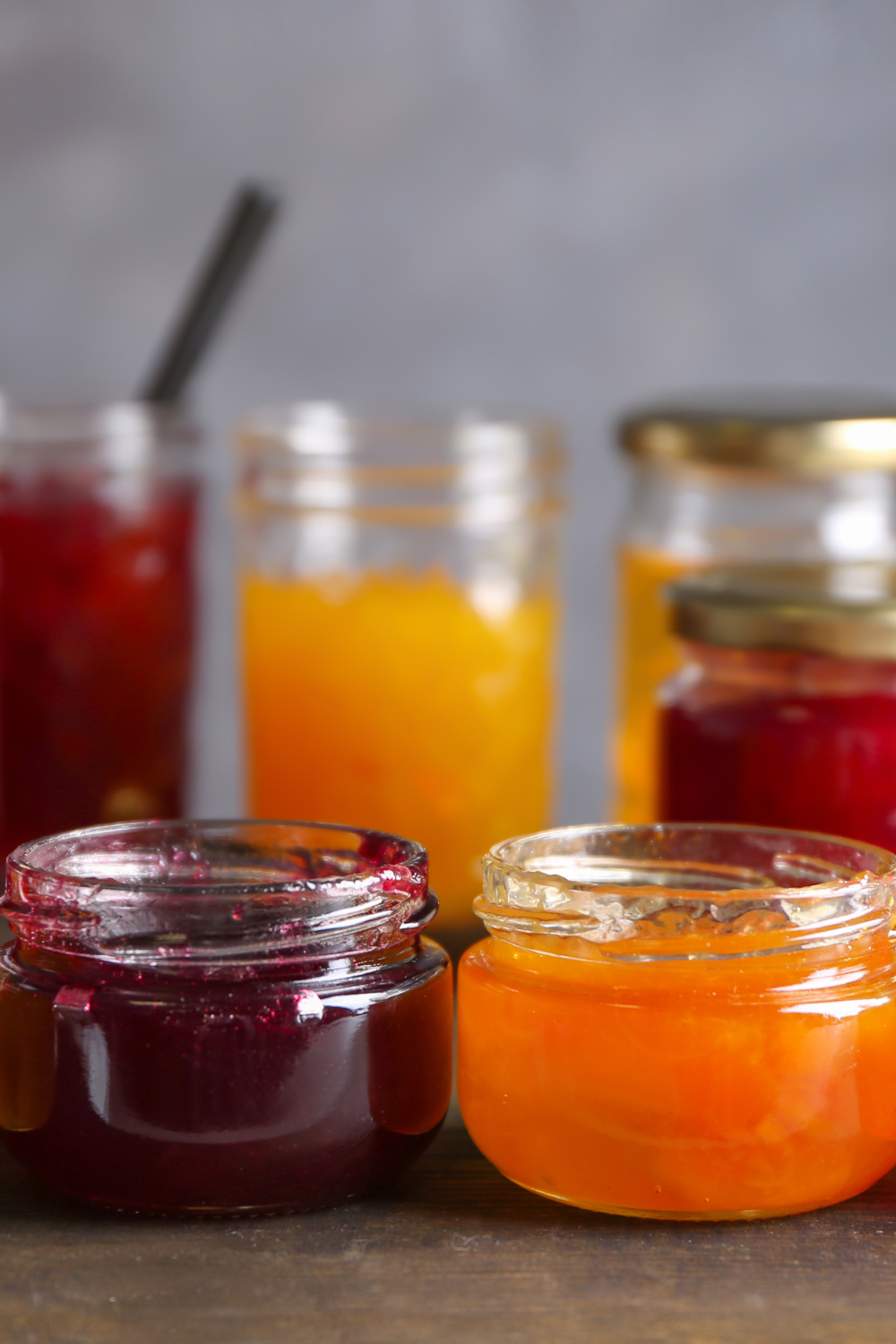 Image illustrates homemade jams for handmade Christmas gifts.
