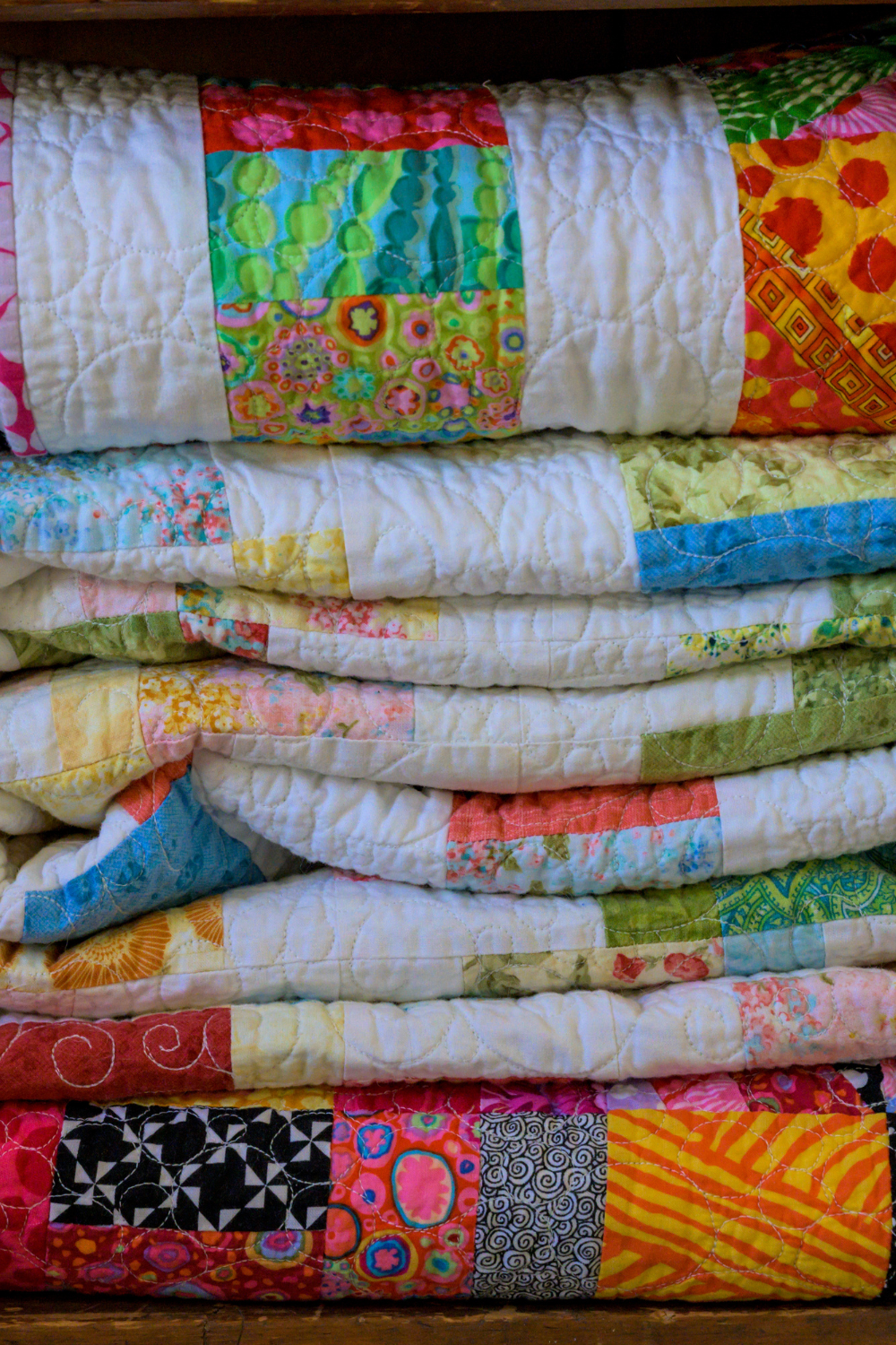 Image illustrates handmade quilts for handmade Christmas gifts.