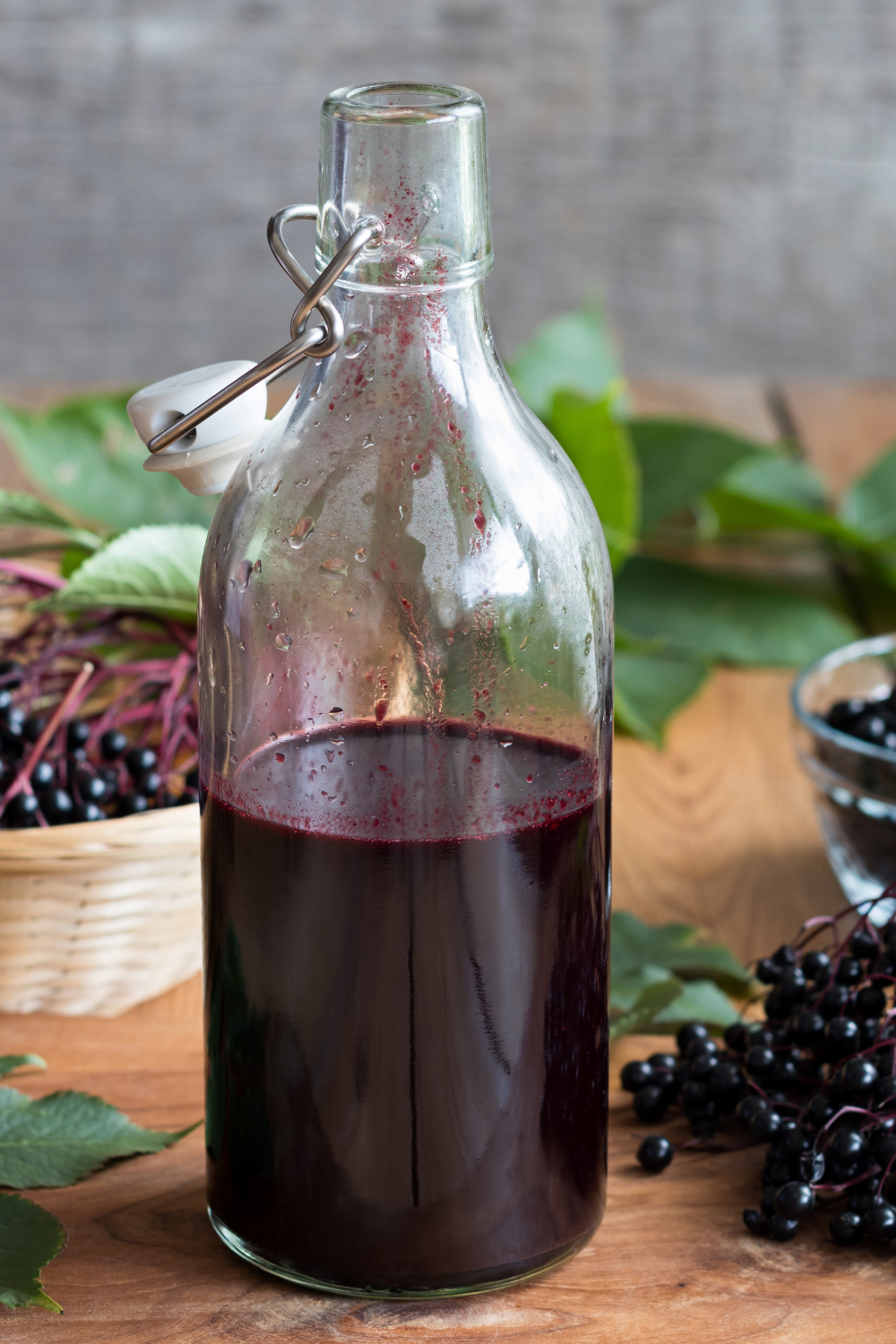 Image illustrates elderberry syrup for immune support.