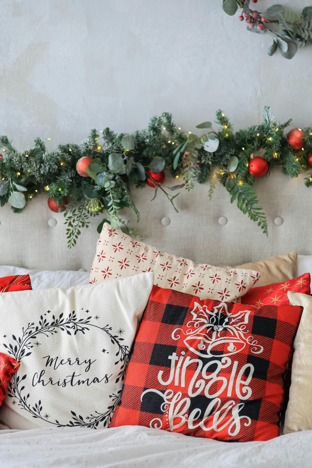 Image illustrates plaid flannel throw pillow for Christmas vintage decor.